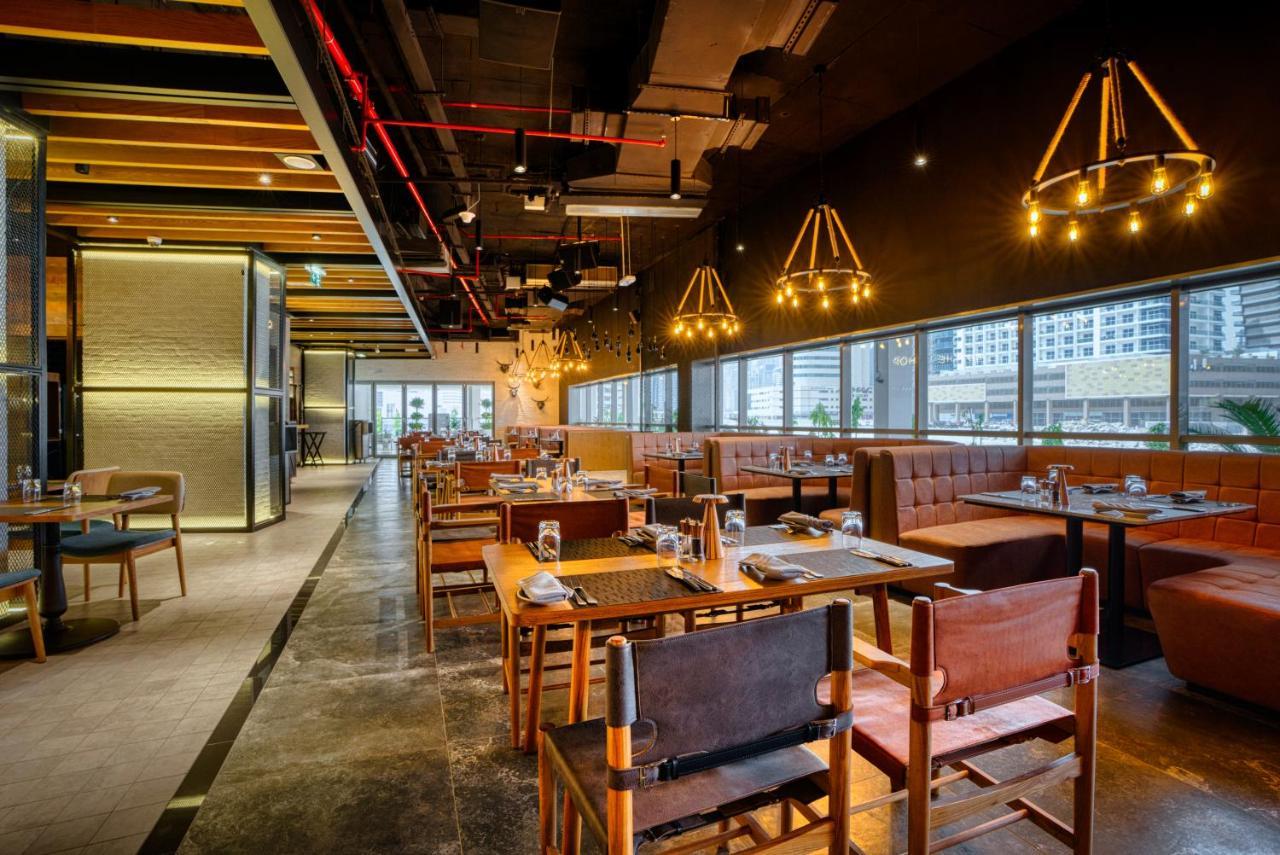 Hotel The First Collection Dubai Business Bay Esterno foto Interior of the restaurant