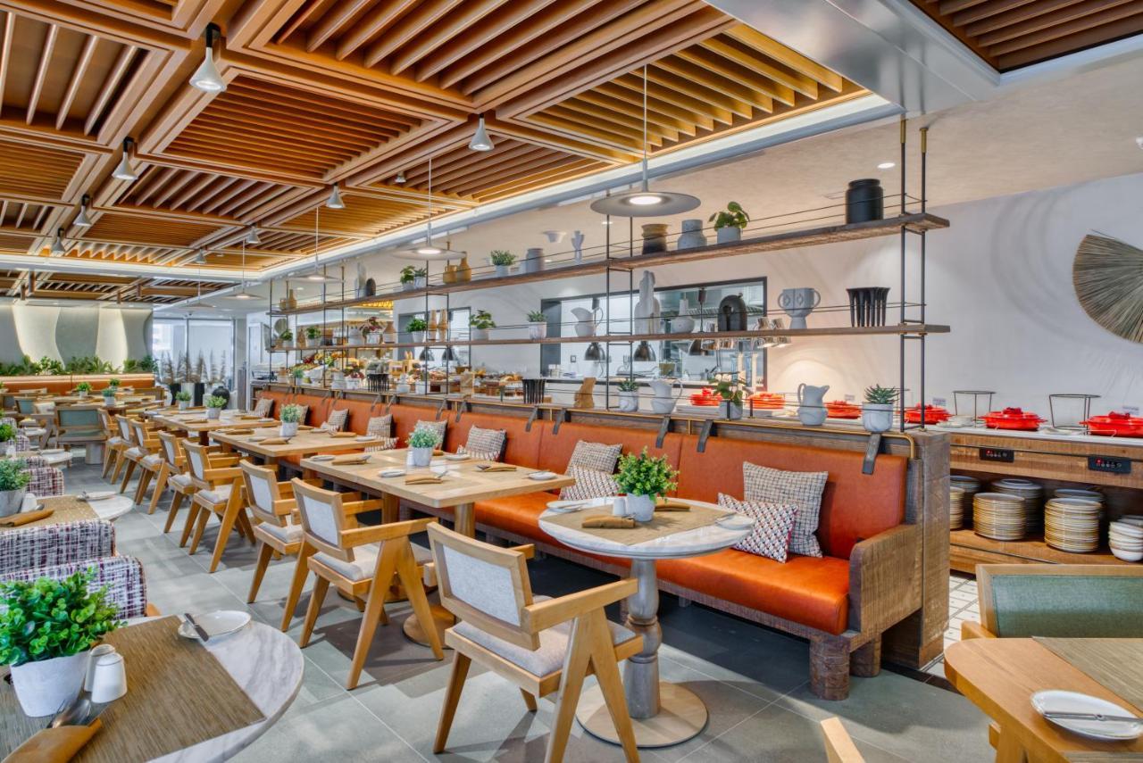 Hotel The First Collection Dubai Business Bay Esterno foto Interior of the restaurant