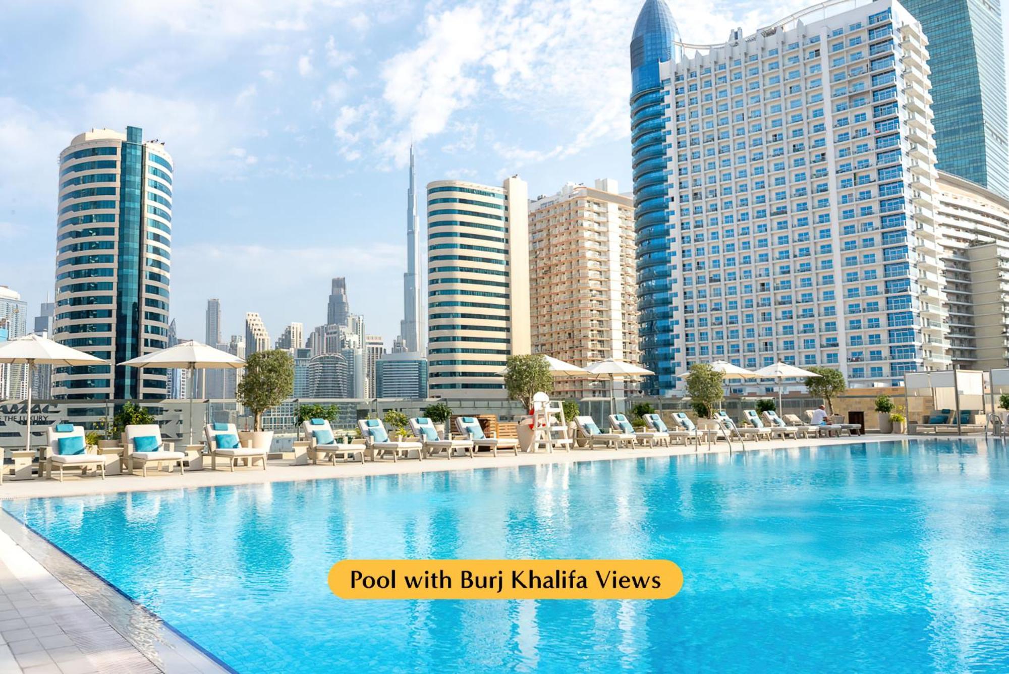 Hotel The First Collection Dubai Business Bay Esterno foto Pool with Burj Khalifa views